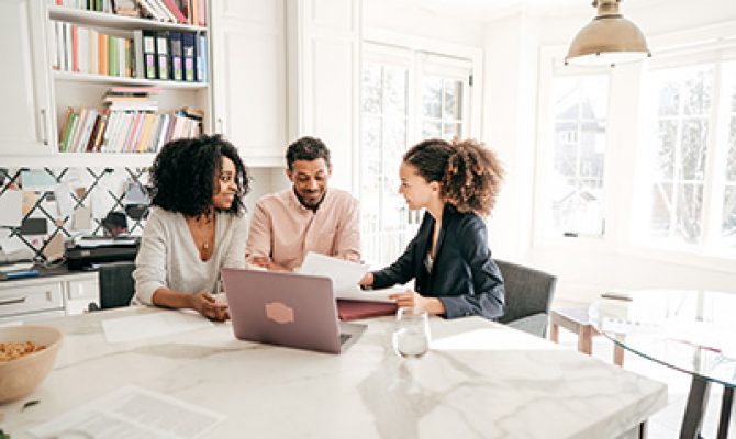 a group of people in a meeting