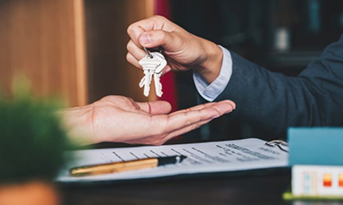 A hand getting a key